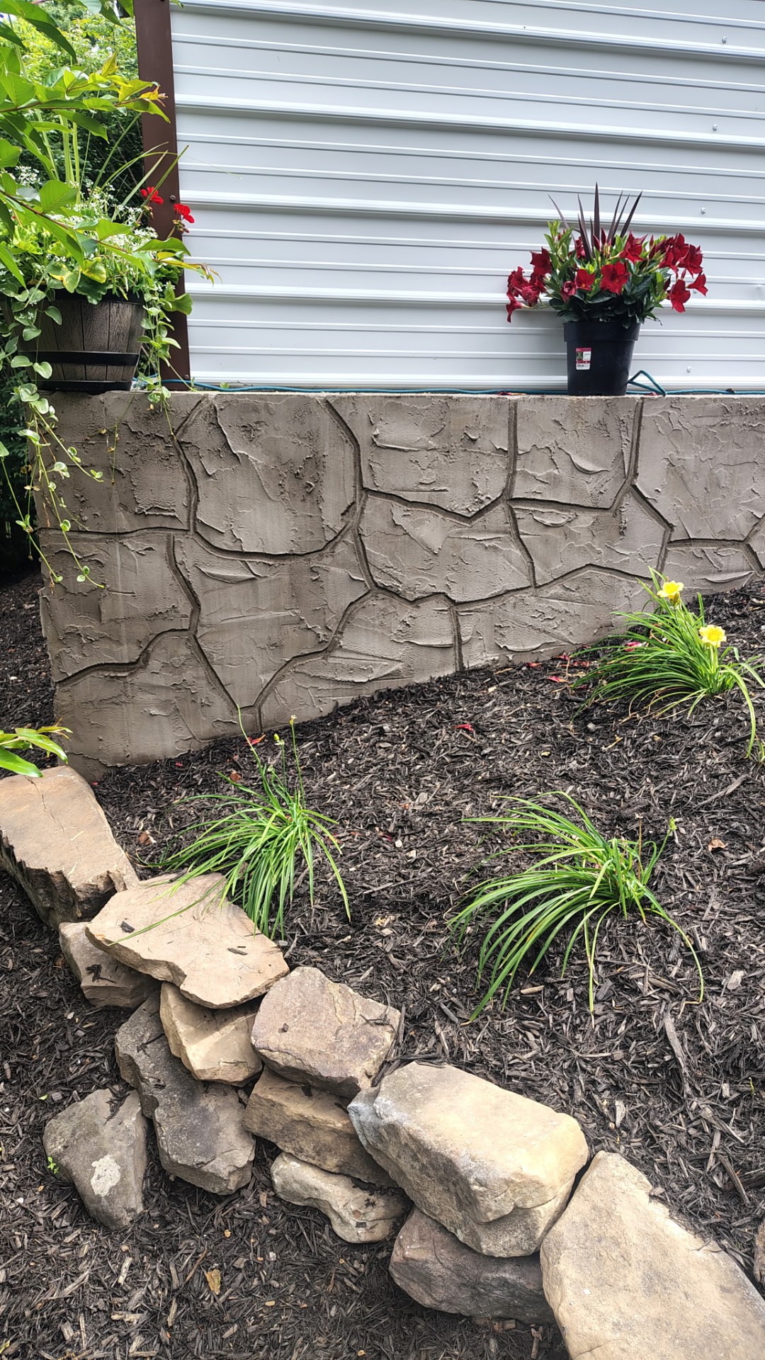 Textured stucco retaining wall